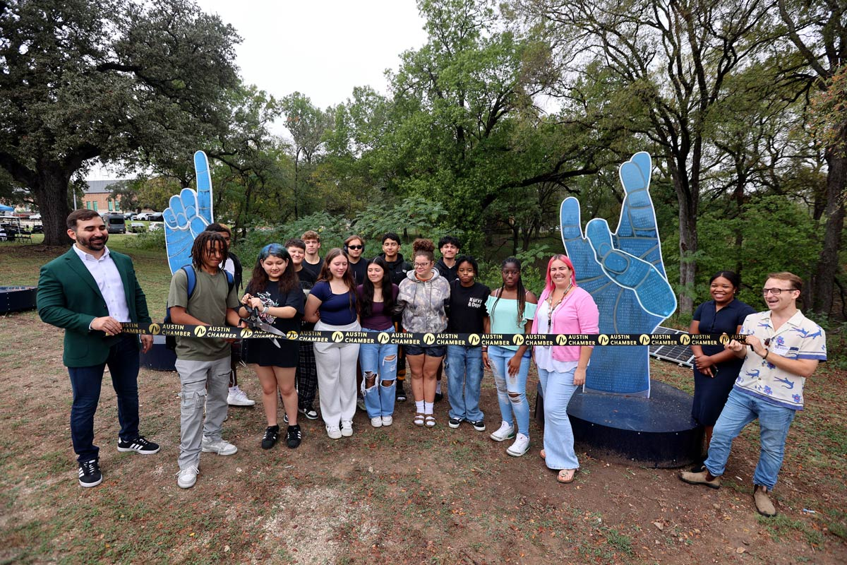 Texas School for the Deaf students, collaborators, and community members at the ATX Voices ribbon cutting