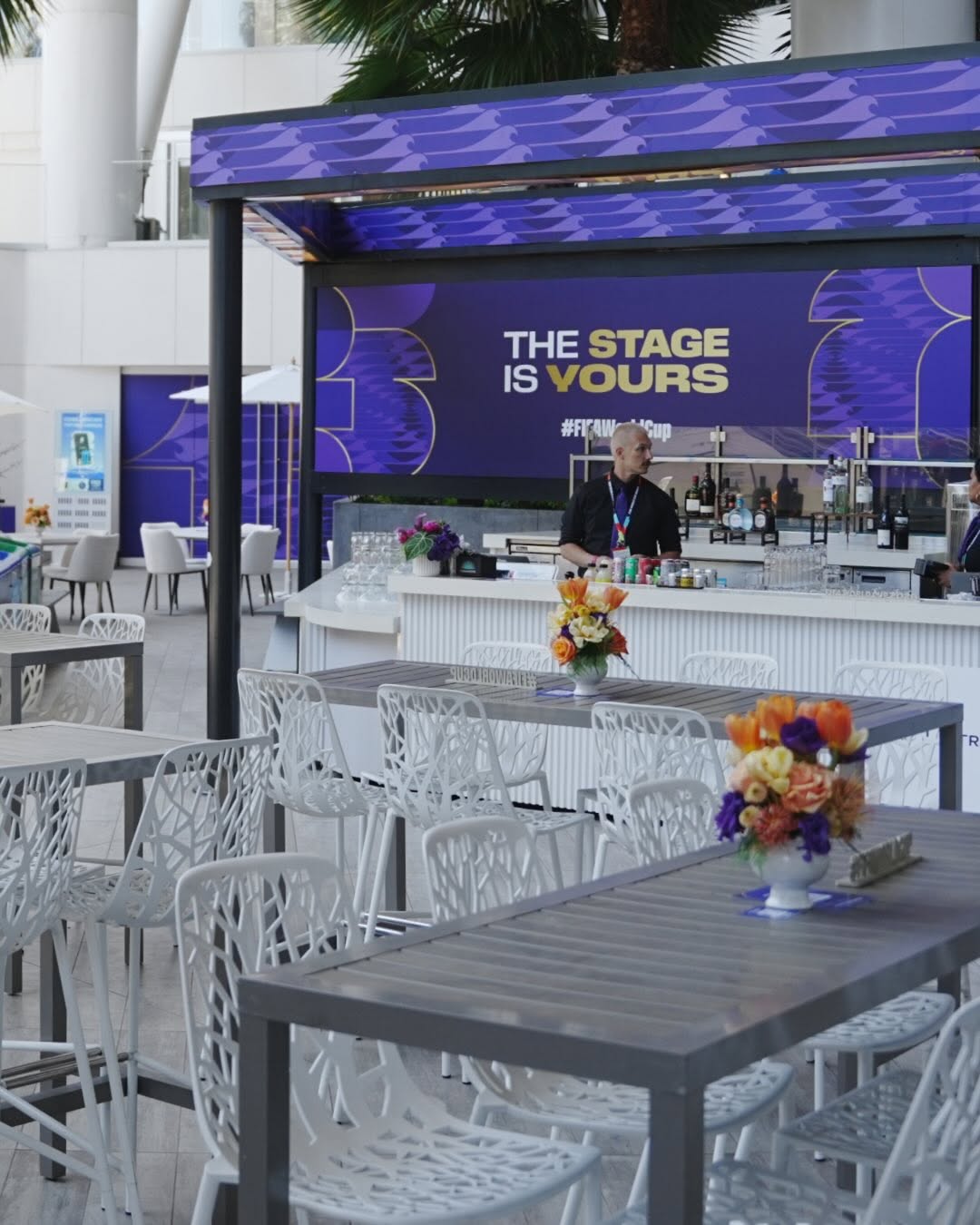 Purple FIFA World Cup hospitality bar and outdoor dining environment